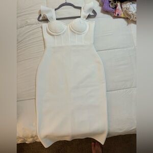 White corset lined dress with slit in the back